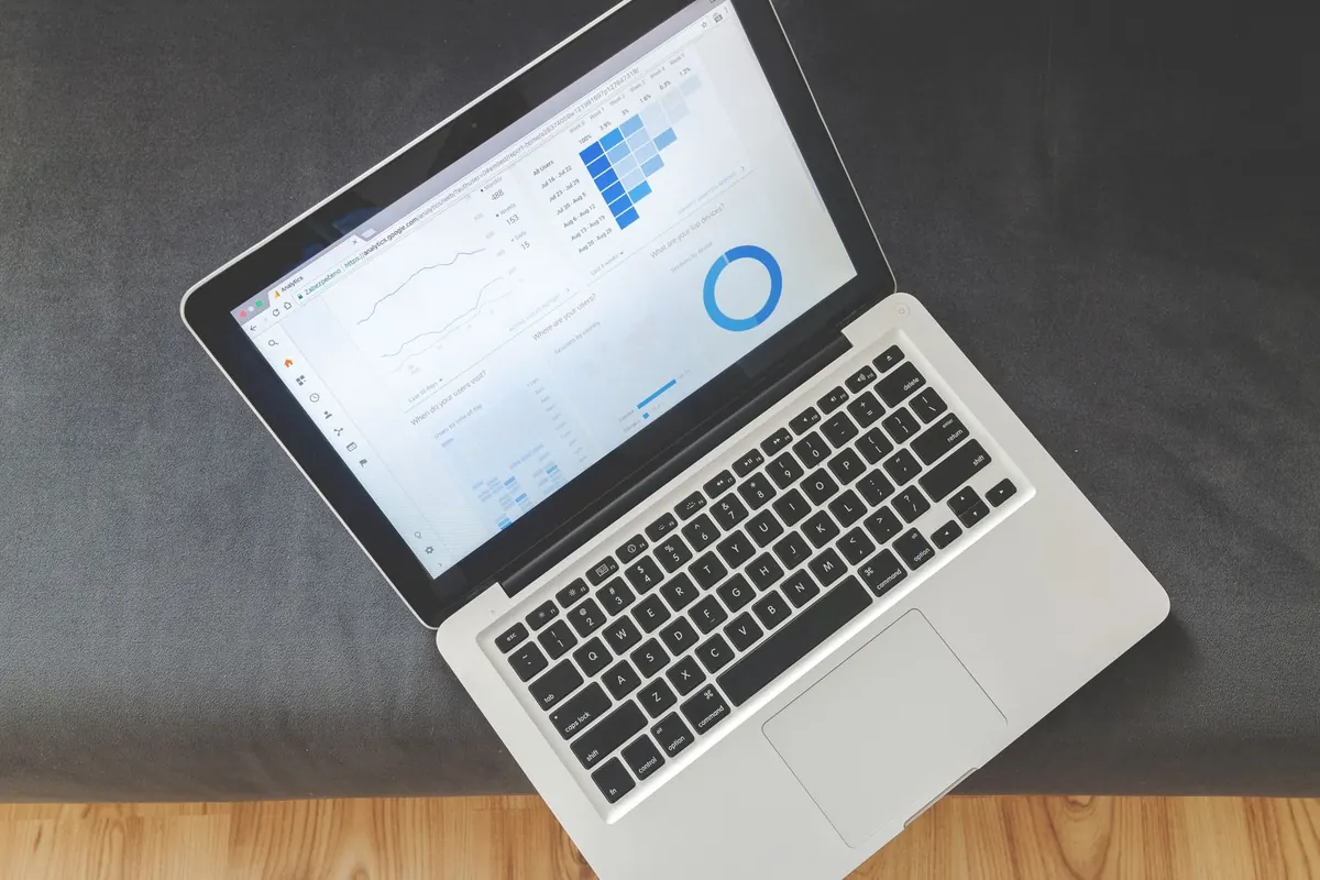 Laptop displaying website analytics dashboards