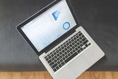 Laptop displaying website analytics dashboards